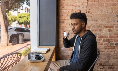 man drinking coffee