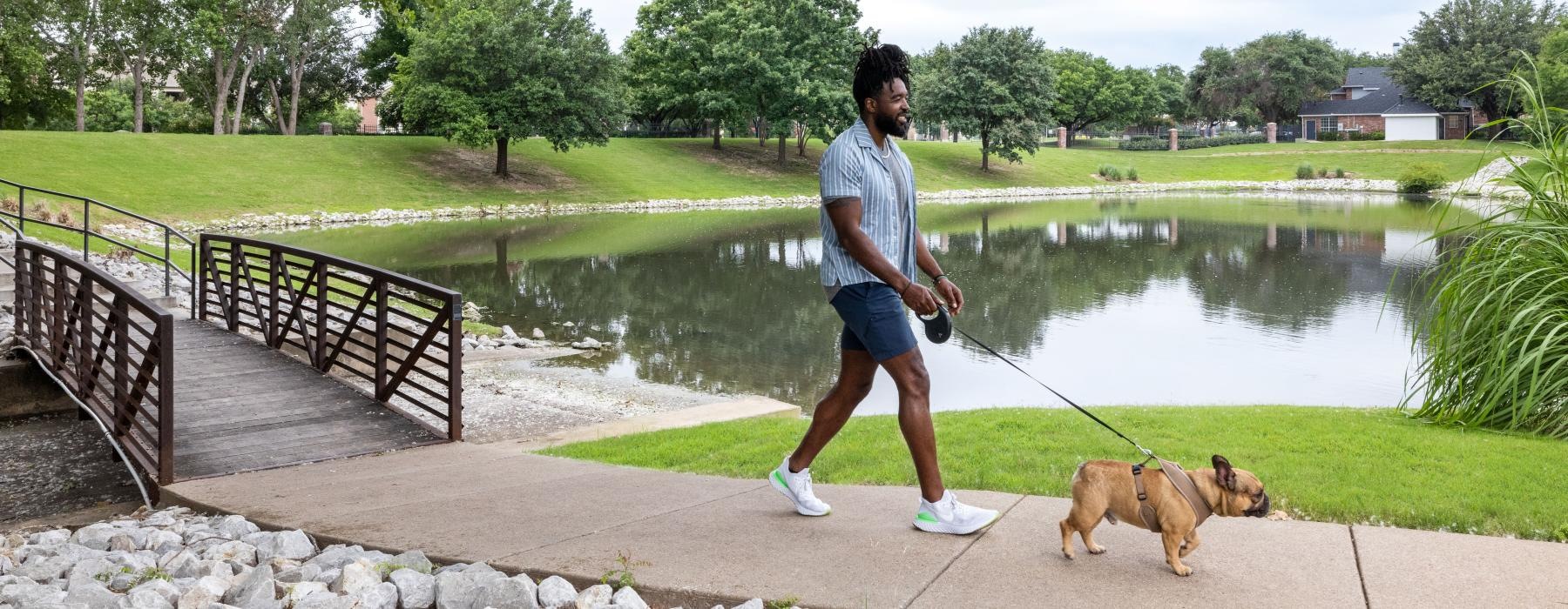 a man walking a dog