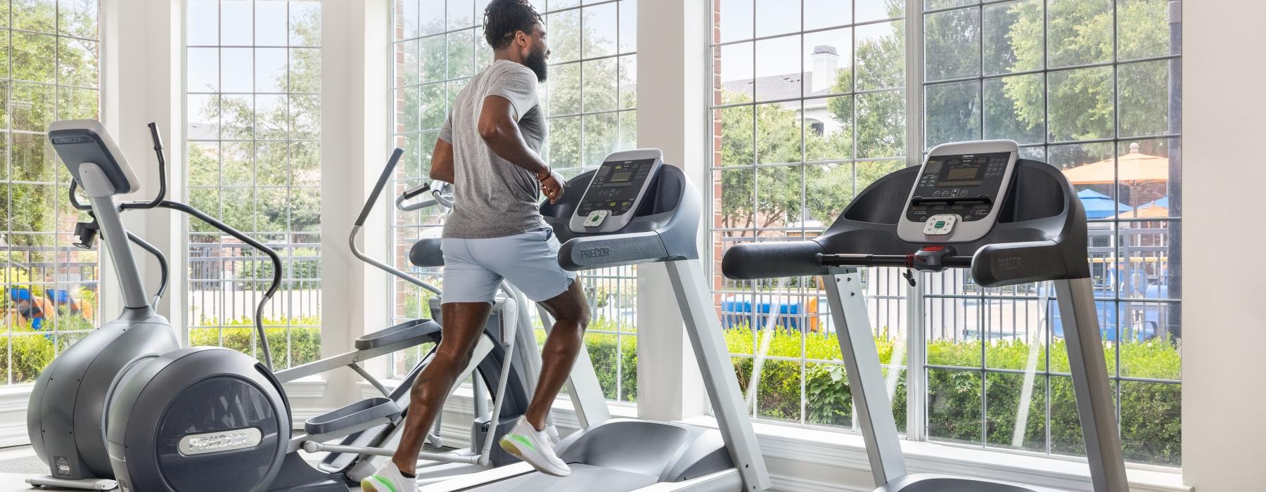 a man working out on a treadmill