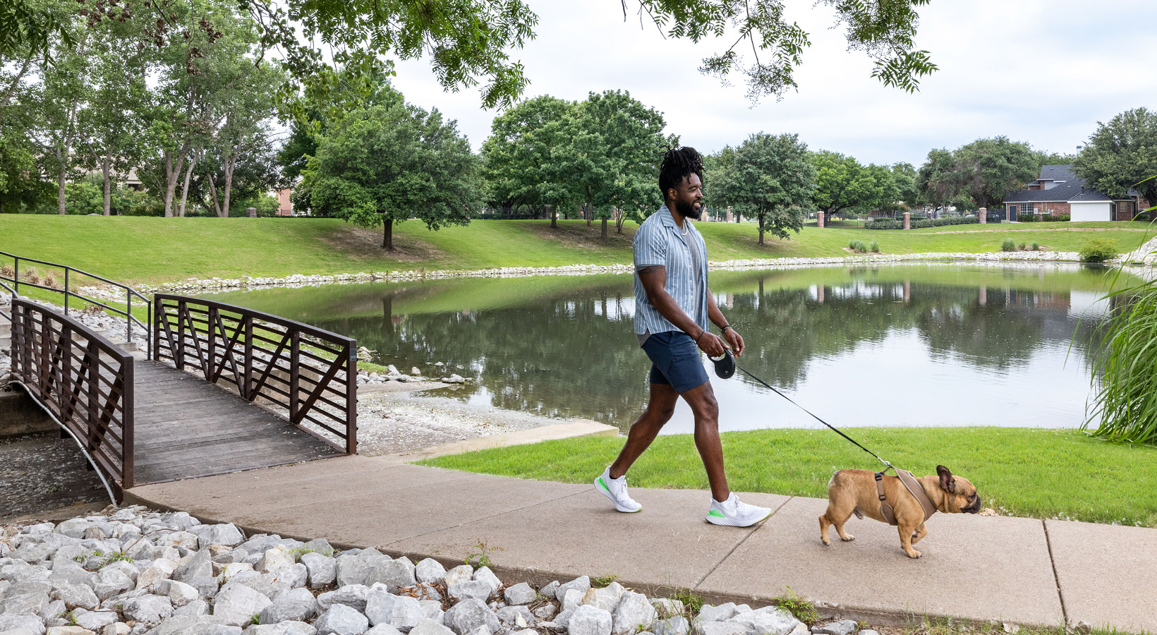 a man walking his dog